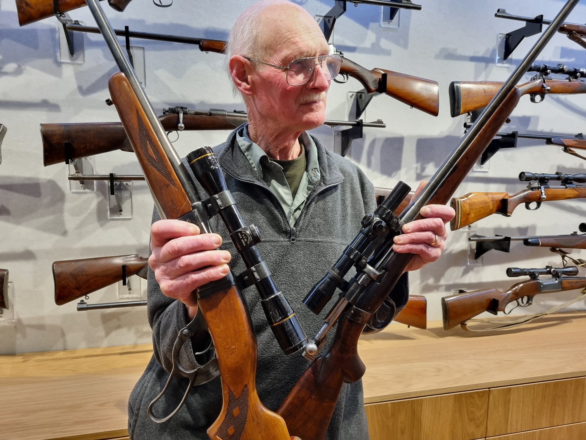 Dr Chaz Forsyth at the NZDA Hunting and Shooting Museum, donating firearms to the collection